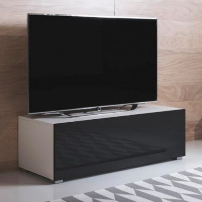 Televisão preta sobre móvel branco com porta preta em ambiente interior