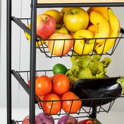 Fruteira metálica com cestos cheios de frutas e legumes coloridos