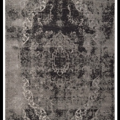 Tapete cinza e preto com padrão oriental desgastado