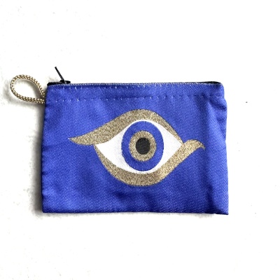 Carteira azul com desenho de olho dourado, branco e azul