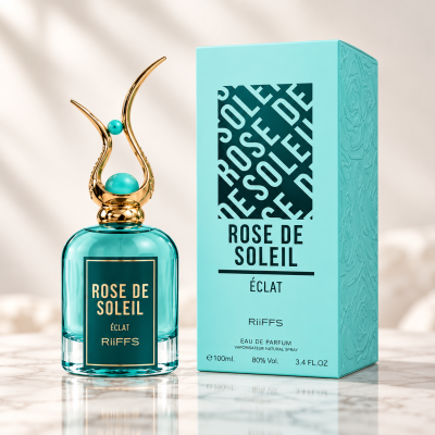 Frasco azul turquesa com tampa dourada e caixa de perfume ROSE DE SOLEIL ÉCLAT