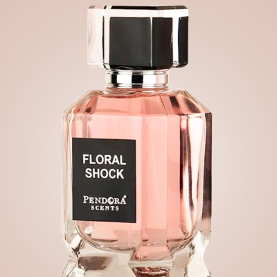 Frasco de perfume Floral Shock com líquido rosa e tampa prateada