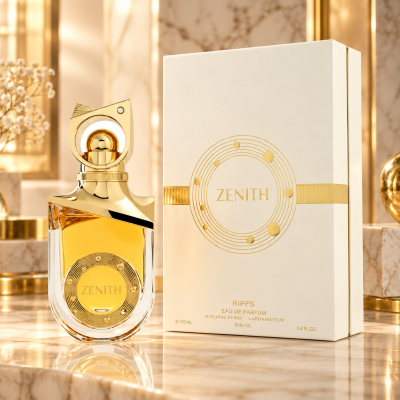 Frasco e caixa de perfume Zenith em vidro e dourado sobre mármore