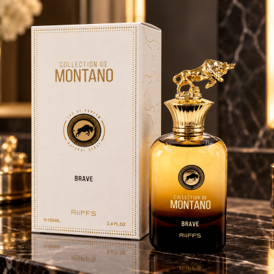 Frasco de perfume dourado com embalagem branca sobre bancada de mármore negro.