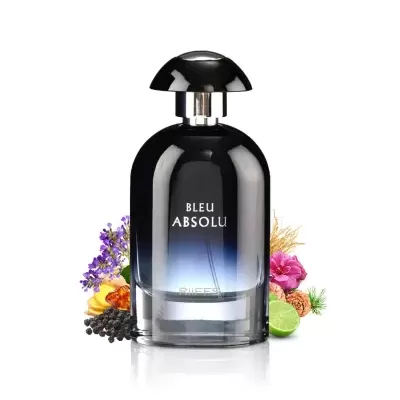 Frasco de perfume bleu absolu com flores e frutas ao fundo