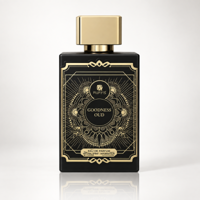 Frasco de perfume preto com detalhes dourados e tampa dourada