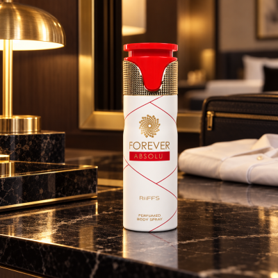 Frasco de spray perfumado FOREVER ABSOLU RiiFFS branco com tampa vermelha e detalhes dourados numa mesa de mármore preto