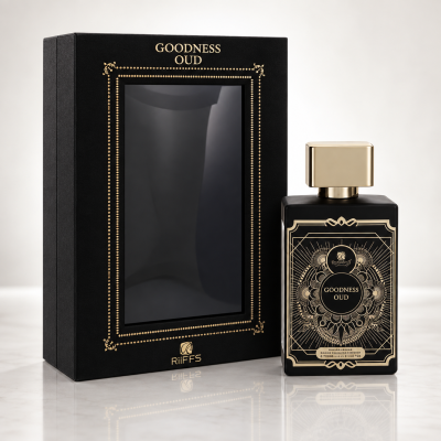 Frasco de perfume preto com caixa preta e dourado