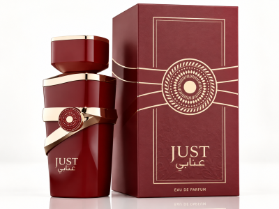 Frasco e caixa de perfume vermelhos com detalhes dourados e texto JUST عِنابِي