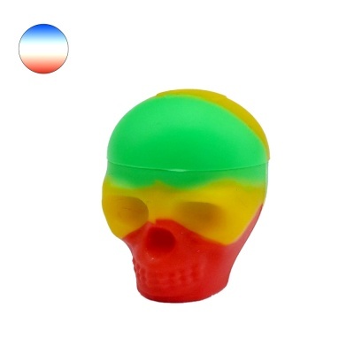 Cabeça de caveira colorida em verde, amarelo e vermelho