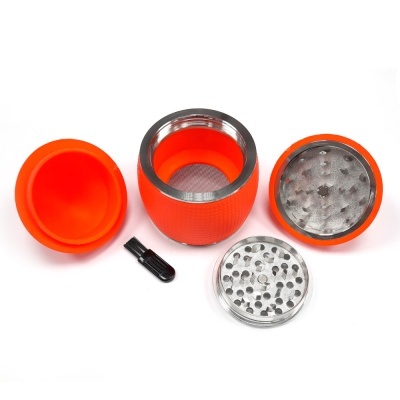 grelhador de ervas metálico com revestimento em silicone laranja e pincel preto