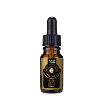 Frasco de óleo de cannabis com rótulo dourado e preto