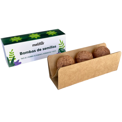 Bombas de semillas meliflór com três bolas de terra em embalagem de cartão