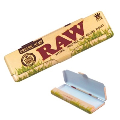Estojo metálico bege com letras RAW e padrão de relva para papéis de enrolar RAW.