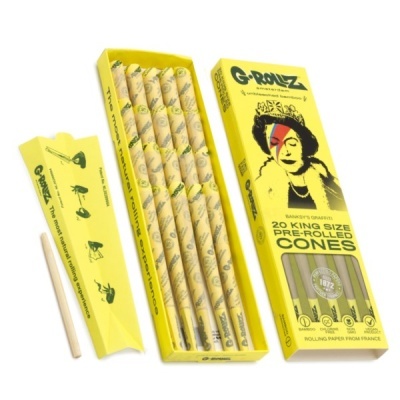 Cones pré-enrolados em caixa amarela com texto e design Banksy