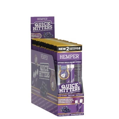 Display roxo de produtos QUICK HITTERS com texto e imagem de uvas