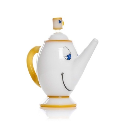 Bule de porcelana branco e amarelo com rosto sorridente e olhos azuis