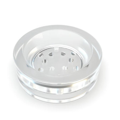 Produto redondo transparente com furos circulares no centro