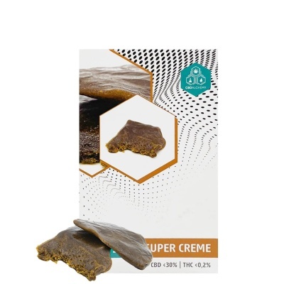 Super Creme CBD embalagem branca com pedaços de material castanho