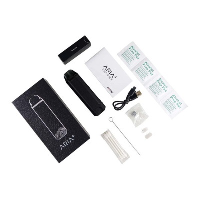 Kit vaporizador ARIA+ preto com acessórios e manual em fundo branco