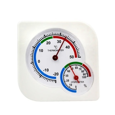 Manómetro branco com termómetro e higrómetro analógicos.