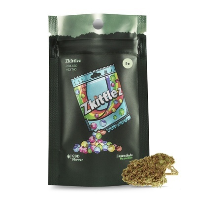 Embalagem preta fosca com ilustração colorida de pacote azul Zkittlez e flor de CBD