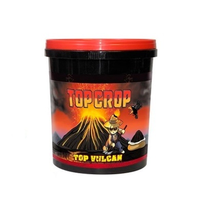 Recipiente preto com tampa vermelha e rótulo colorido com vulcão em erupção e texto