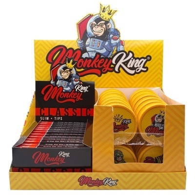 Expositor amarelo com pacotes de papel de fumar e embalagens redondas Monkey King