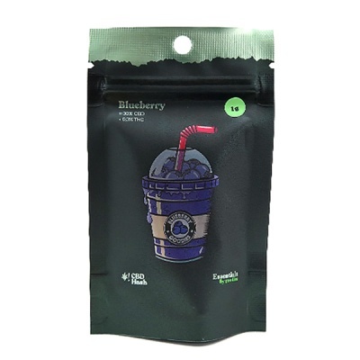 Embalagem preta de produto Blueberry com ilustração de bebida azul e texto informativo