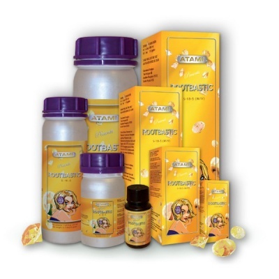 Produtos ATAMI Rootbastic com embalagens amarelas e frascos com tampas roxas e preta