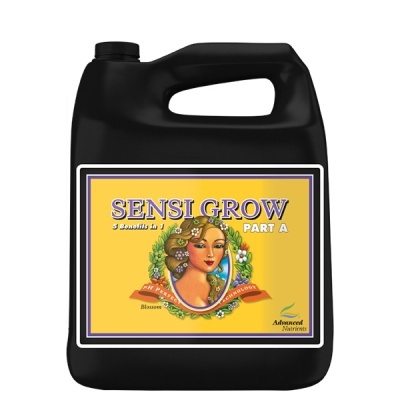 Frasco preto com etiqueta amarela de SENSI GROW PART A, conteúdo líquido.