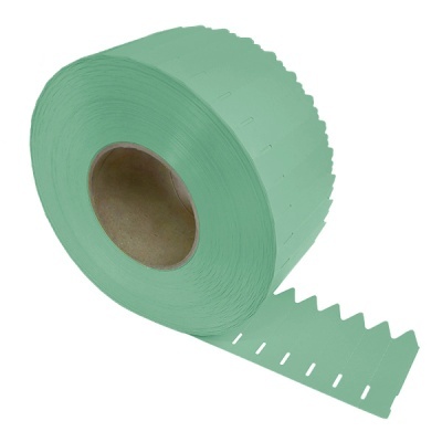 Rolo grande de etiquetas autocolantes verdes com recortes e furos
