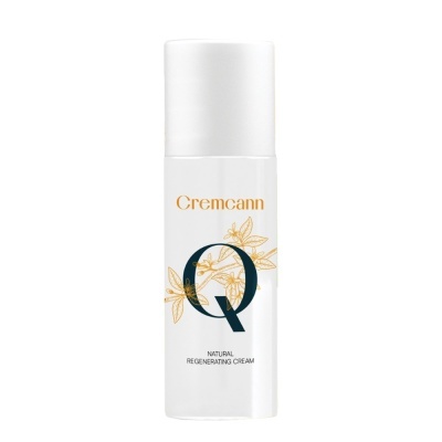 Frasco branco de creme regenerador natural da Cremcann com design de folhas e letra Q preta