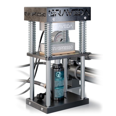 Máquina de prensar metálica Graspresso Graved com molas prateadas e medidor analógico.