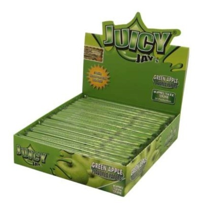 Embalagens verdes de Juicy Jays Green Apple em expositor verde.