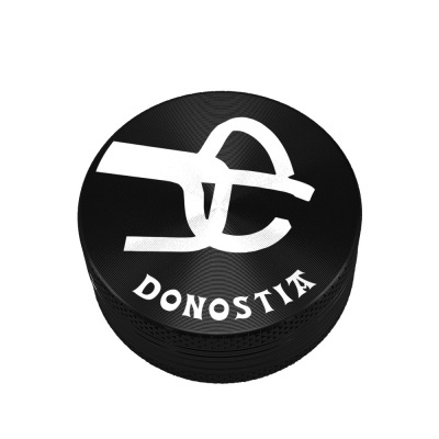 Disco de hóquei preto com texto branco DONOSTIA e logotipo