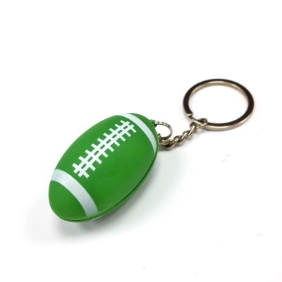 Porta-chaves bola de râguebi verde e branca com anel metálico