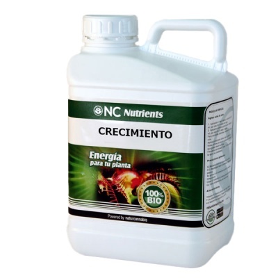 Recipiente de plástico branco com fertilizante para plantas rotulado em espanhol