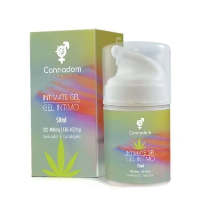 Frasco e caixa de gel íntimo Cannadom Premium com design colorido e texto informativo