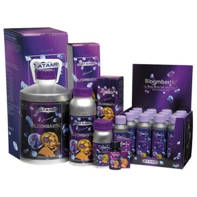 Produtos ATAMI BLOOMBASTIC em embalagens roxas com ilustrações e frascos