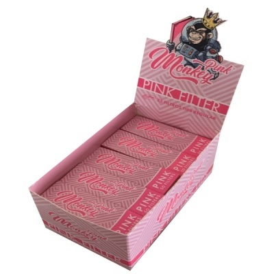 Caixa de cartolina rosa com embalagens rotuladas Pink Monkey e Pink Filter e desenho de um macaco com coroa.