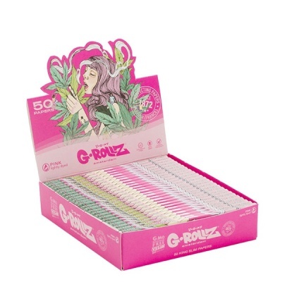 Caixa cor-de-rosa com cadernos de papel para enrolar variados