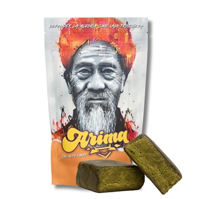 Embalagem com rosto ilustrado e produto verde em bloco