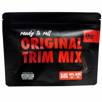 embalagem preta com texto ORIGINAL TRIM MIX em vermelho e outros textos em branco e vermelho
