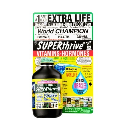 Frasco preto com rótulo colorido e embalagem com texto e gráficos sobre SUPERthrive vitaminas e hormonas.