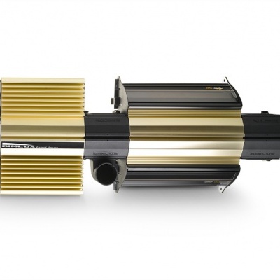 Equipamento mecânico cilíndrico dourado e preto em fundo branco