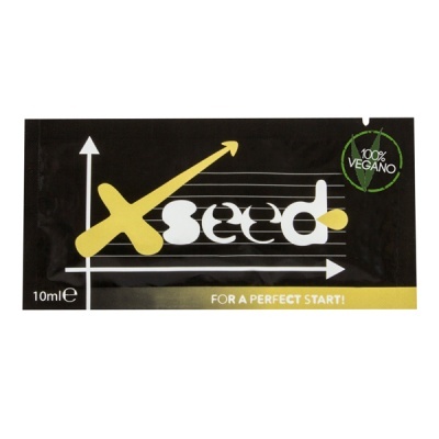 Embalagem preta de produto Xseed com texto e gráficos amarelos e brancos