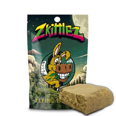 Embalagem Zkittlez com desenho de burro amarelo e resina castanha à frente