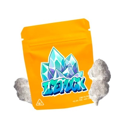 Embalagem amarela com rotulo ICE ROCK e flores secas ao lado