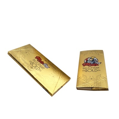 Duas embalagens douradas com texto Monkey King e BILLIONAIRE GOLD